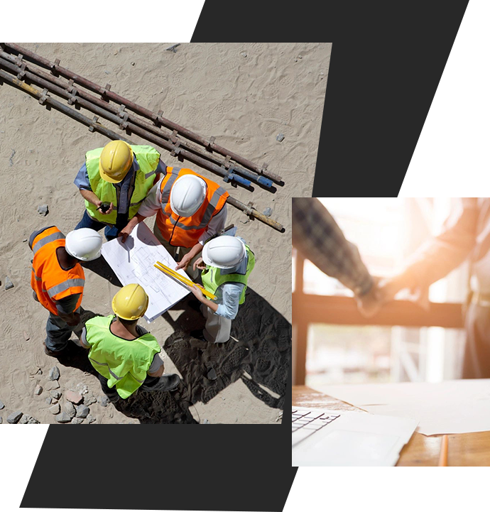 A group of construction workers standing around a building.