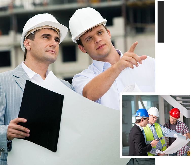 A group of men in hard hats are holding blueprints.